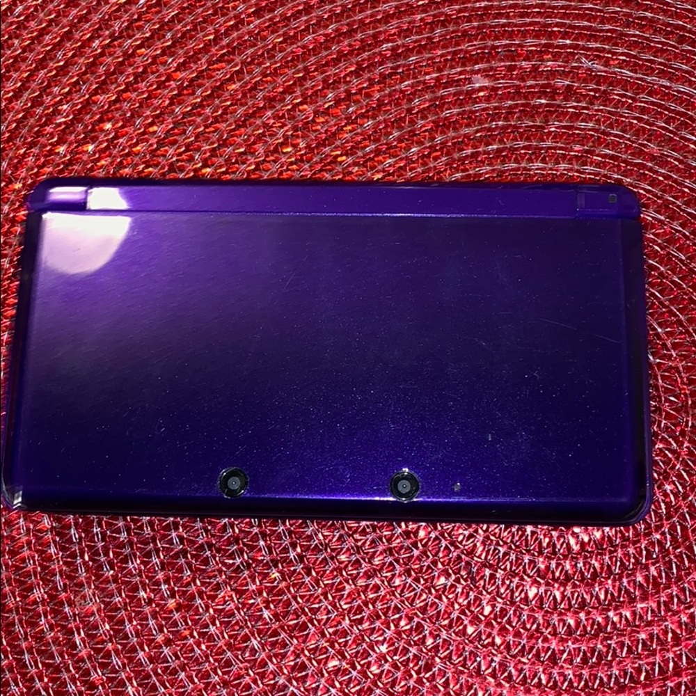 3DSI in mint condition purple with games